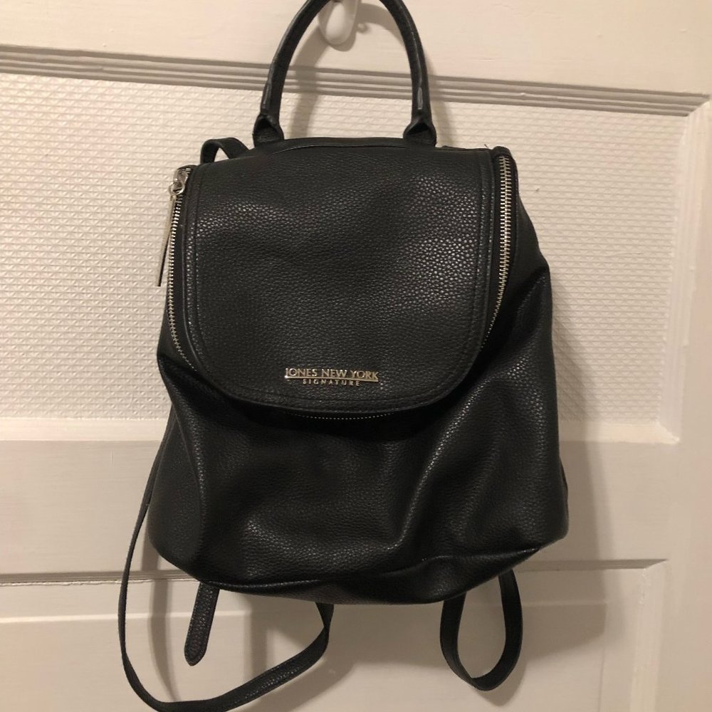 Black leather-style backpack